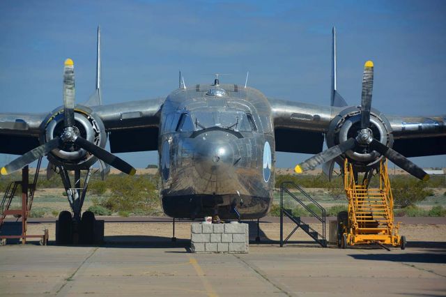 FAIRCHILD (1) Flying Boxcar (N15501) - Fairchild C-119G Flying Boxcar N15501 is part of the Lauridsen Collection at Buckeye Municipal Airport. It will be familiar to those who saw the remake of the movie Flight of the Phoenix.