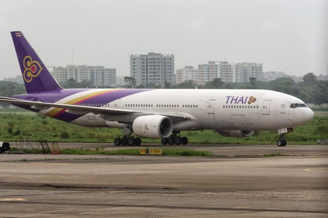 Boeing 777-200 (HS-TJV) - 28th August, 2024: Flight TG 321 from Bangkok Suvarnabhumi airport taxiing to the ramp at Dhaka's Zia International Airport. 