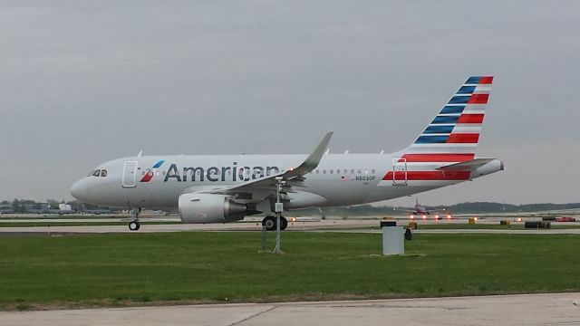 Airbus A319 (N8030F) - Delivered 4/13/15 to American Airlines, I captured her before take-off from General Mitchell International 5/14/15.