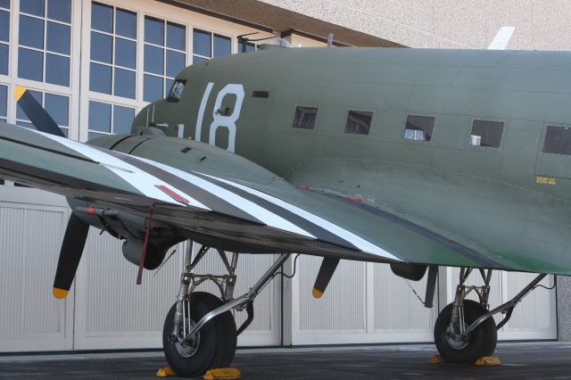 — — - Kermit Week's C-47 at EAA Eagle Hangar Oshkosh