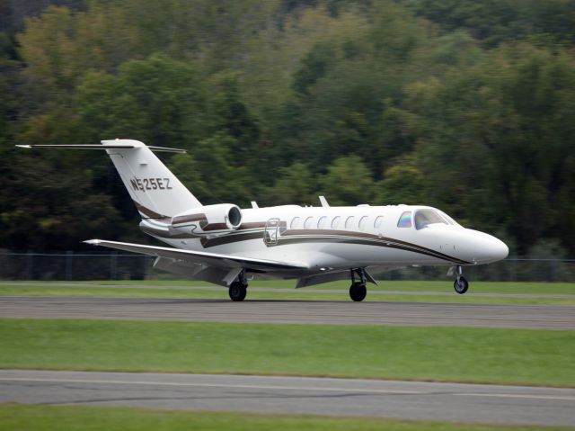 Cessna Citation CJ3 (N525EZ) - Landing rollout runway 08 at Danbury CT.