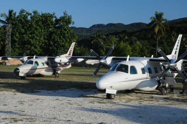 Mitsubishi MU-2 (N59KS) - Haiti, "birds of a feather", delivering earthquake supplies into Haiti