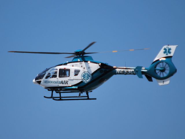 Eurocopter EC-635 (N433CM) - CAROLINAS HEALTHCARE SYSTEM DBA lifting off at Concord Regional Airport / Concord, NC 7/27/11