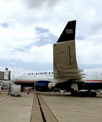 Airbus A330-200 (N282AY) - Just pulling into Gate 11 at Concourse D, Charlotte, North Carolina.