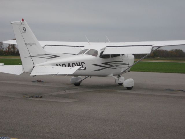 Cessna Skyhawk (N840MC) - just got in the plane after pre-flight checks. Note the dry pavement in the shape of a plane