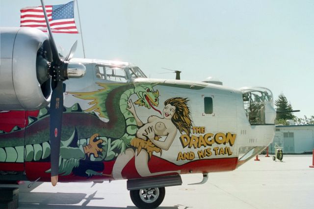 Consolidated B-24 Liberator (NX224J) - "Dragon and His Tail" nose art.  Too bad it's been repainted.