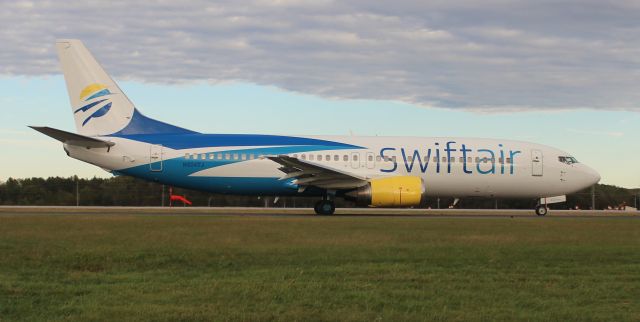 BOEING 737-400 (N804TJ) - A Swift Air Boeing 737-401 taxiing for takeoff at Carl T. Jones Field, Huntsville International Airport, AL - October 17, 2018. Photo taken about 5:10pm from outside the airport perimeter fence along the taxiway paralleling 36R.