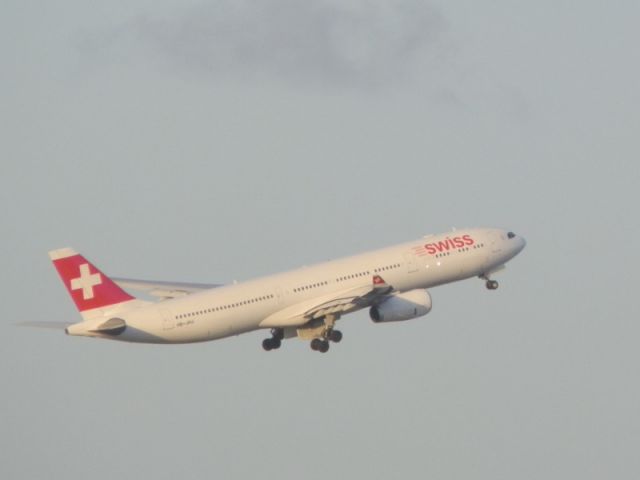 Airbus A330-300 (HB-JHJ) - After all phases of departure.Pushback(Towbar),Taxi,This Swiss A330-300.Takes off!