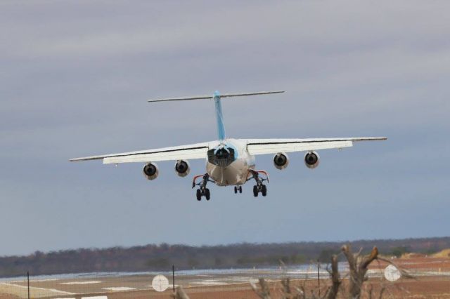 British Aerospace BAe-146-300 (VH-NJN) - VH-NJN sliding into RWY 09 YMEK in 35kt winds