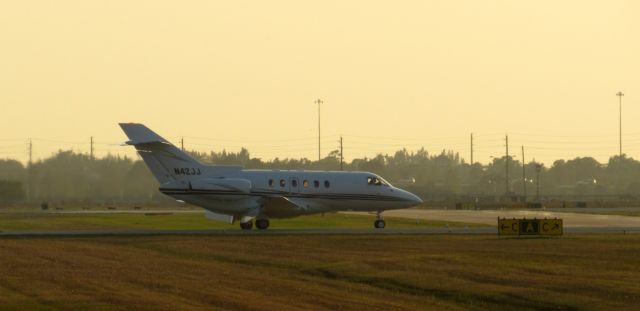 Hawker 800 (N42JJ) - Five McDs LLC Hawker 800XP registered N42JJ in the golden hour at KPGD.