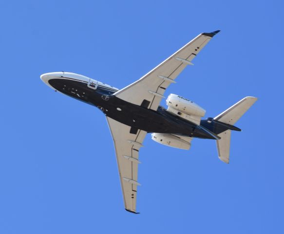 Embraer Legacy 450 (N406FX) - An Embraer legacy450 departs mid morning from Monmouth Airport, NJ April 2021.