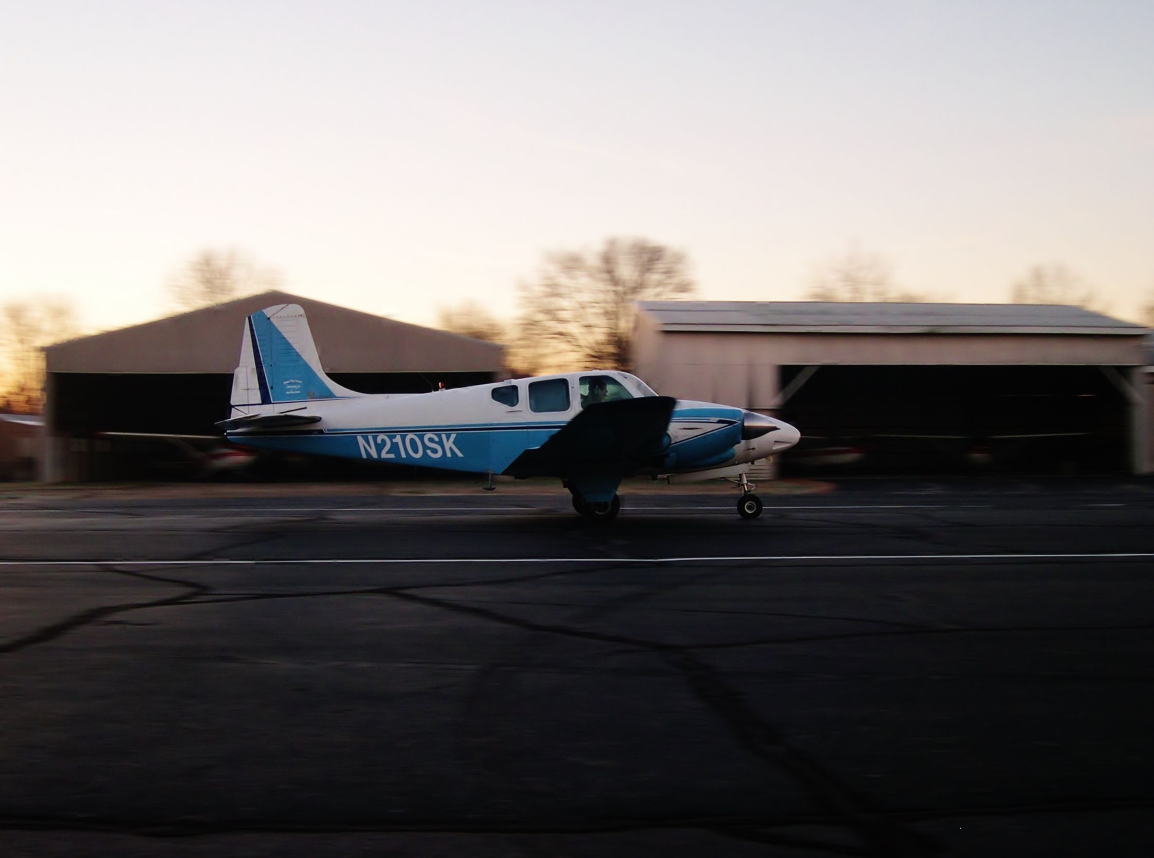 Beechcraft Travel Air (N210SK) - BE95 Travel Air rolling out bright and early at Sky King 3I3. 