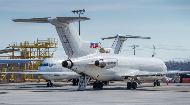 BOEING 727-200 (C-GLKF) - With C-GNKF, both former Kelowna Flightcraft Air Charter parked out at Hamilton 