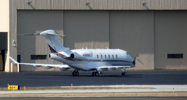 Canadair Challenger 350 (N767QS) - Catching some tarmac time is this 2014 Bombardier Canadair Challenger 350 in the Winter of 2021.