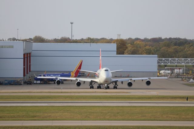 Boeing 747-400 (LX-YCV) - Face off with "Monte Rosa". Perfect view of the 747 exiting the IMC to take off