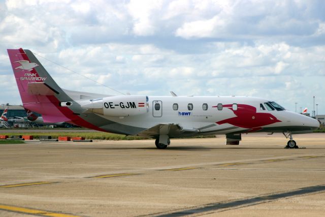 Cessna Citation Excel/XLS (OE-GJM) - Pink Sparrow Citation XLS parked at the VIP Suite on 18-Aug-19 prior to departure for LOWS having recently arrived from EGCC as SOW5.