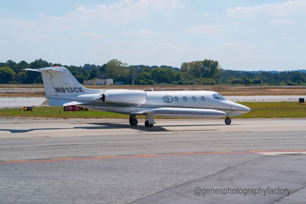 Learjet 35 (N913CK) - Love the wing tanks.  This is at PDK airport. 