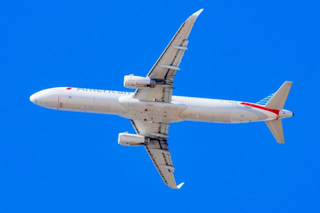 Airbus A321 (N901AA) - American Airlines A321 taking off from DFW on 12/27/22. Taken with a Canon R7 and Tamron 70-200 G2 lens.