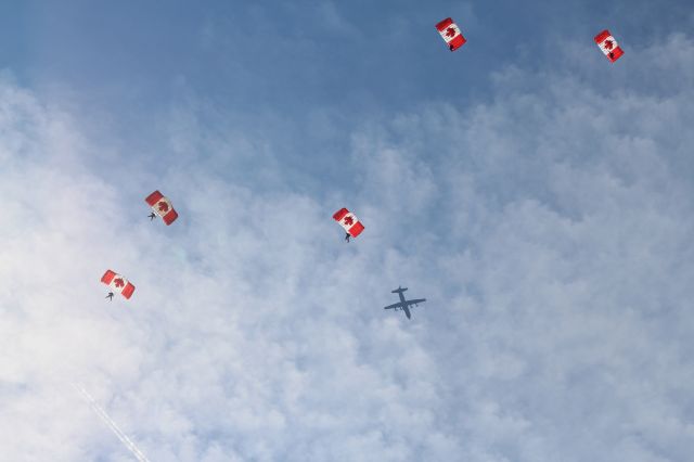 Lockheed C-130 Hercules (13-0617) - C130J passes over head to prepair to drop the 2nd group of skyhawks