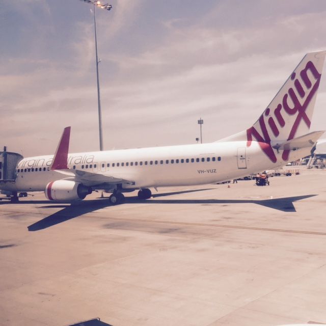 Boeing 737-800 (VH-VUZ) - As we were pushed back for departure on NZ136 B773 ZK-OKO a Virgin B738 was ready for departure from gate 78 heading to NFFN/ Fiji we had priority over the smaller brother aircraft another B744 was waiting for our gate QF16 from KLAX was delayed arriving into BNE that morning 2016 taken from my I phone Seat 3A