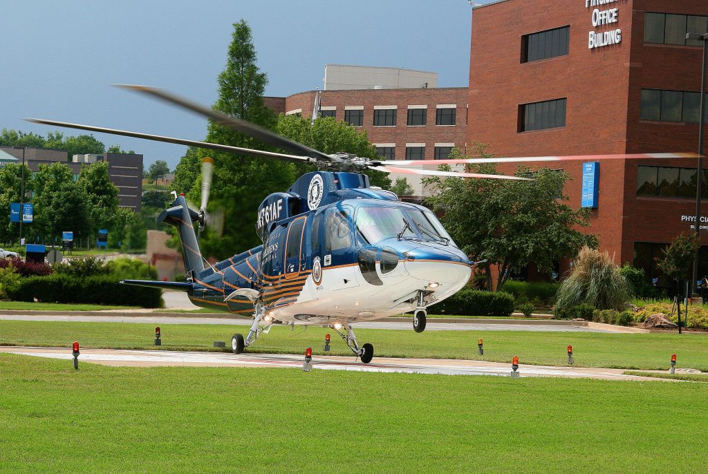 Sikorsky S-76 (N761AF) - Angel Flight 1 lifts off from the helipad at St. Edward Mercy Medical Center just before a severe storm rolls over the city.