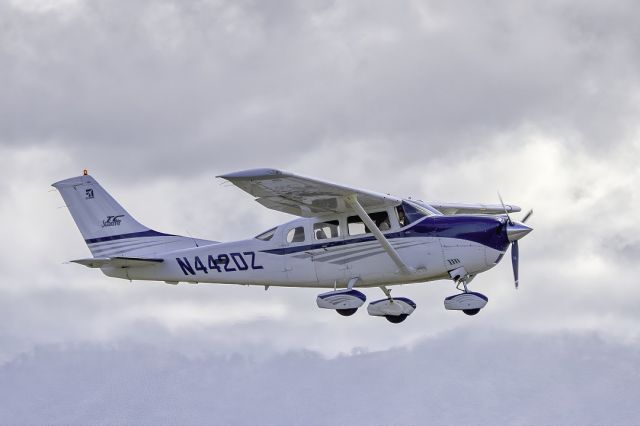 Cessna 206 Stationair (N442DZ) - Cessna T206H Stationair over Livermore Municipal Airport. February 2021.