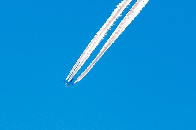 Boeing 747-400 (VH-OEG) - Photographed 38000ft below in Christchurch City as the big Boeing was overflying New Zealand at 458kts on its journey from Santiago, Chile to Sydney Australia, with 2.5 hours to go.