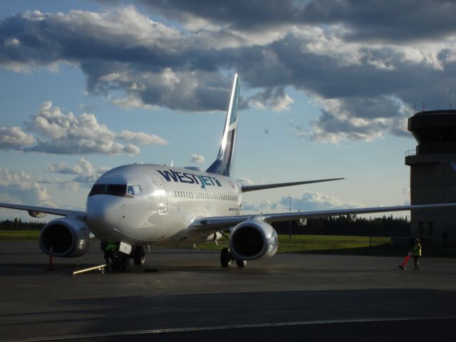 Boeing 737-700 — - WestJet 737-600 coming to a stop at Fort McMurray Airport, Alberta, Canada