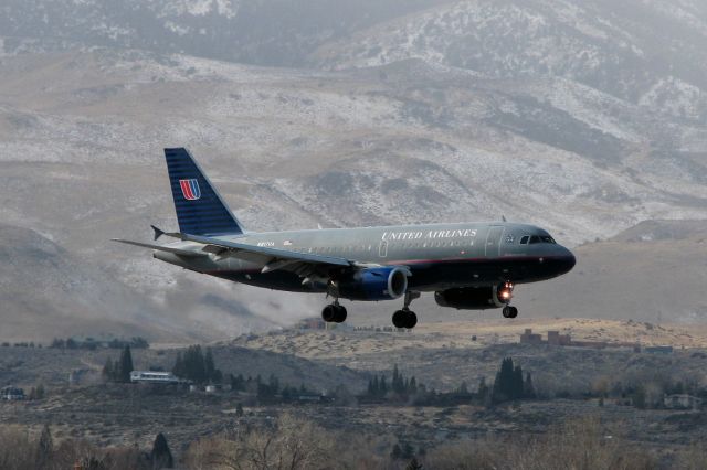 Airbus A319 (N817UA) - This photo was snapped just over a year ago as N817UA was on final to RTIAs runway 34L. Shortly after this pic was taken, this Airbus was repainted in UAs newer livery with the "Blue Tulip" tail design. Someday in the near future, it will get yet another new "suit" when it gets the newest (COA merger) livery.