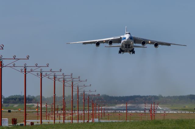 Antonov An-124 Ruslan — - Standing at the end of runway 5R.