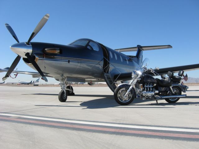 Pilatus PC-12 (C-FPXY) - Pilots 2001 Honda Valkyrie parked along side