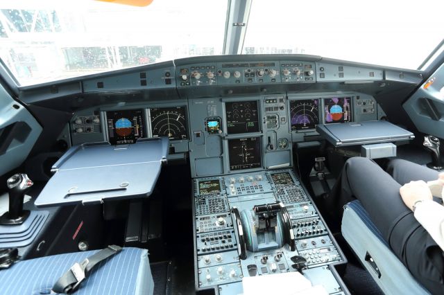 Airbus A320 — - A big thanks to the Captain and First Officer of this Tiger Air, A320 for letting me visit the flightdeck and get this photo.