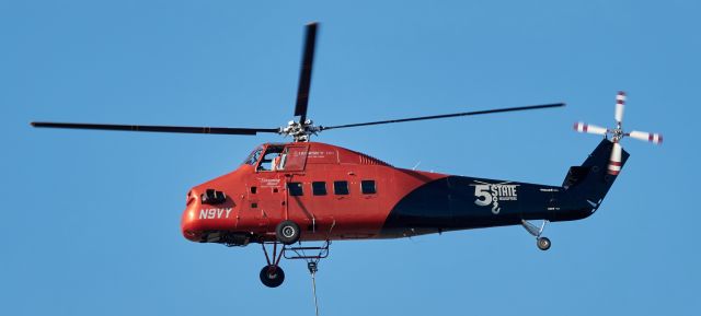 Sikorsky S-58T (N9VY) - 1962 Sikorsky S-58T removing and lifting new HVAC equipment onto the roof of Penn Square Mall in Oklahoma City, OK. Pilot from 5 State Helicopters was a master at the stick and a joy to watch. The downwash was very strong even at 100 yards requiring a fast long lens and good bracing behind a parking lot sign. The "Screaming Mimi" had a staring role in the TV series "Riptide" airing in the mid 1980's.