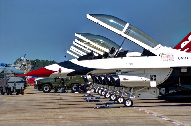 Lockheed F-16 Fighting Falcon — - The U.S. Thunderbirds aircraft sit lined up on the ramp at Tyndall AFB.