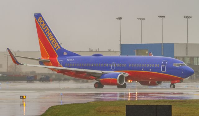 Boeing 737-700 (N246LV) - The next two aircraft to depart this location were a brand new A350 and a retiring 747. Unfortunately we were moved on by police before we could snap them and due to the low cloud, airborne departure shots were not an option!