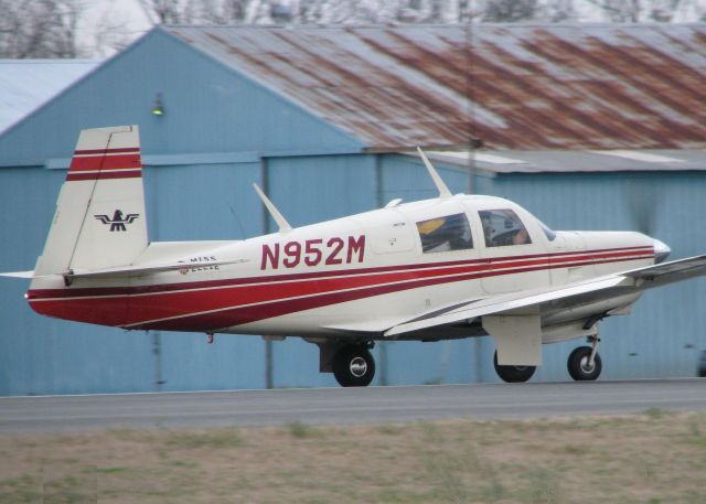 Mooney M-20 (N952M) - Rolling down runway 14 about to lift off from the Shreveport Downtown airport.
