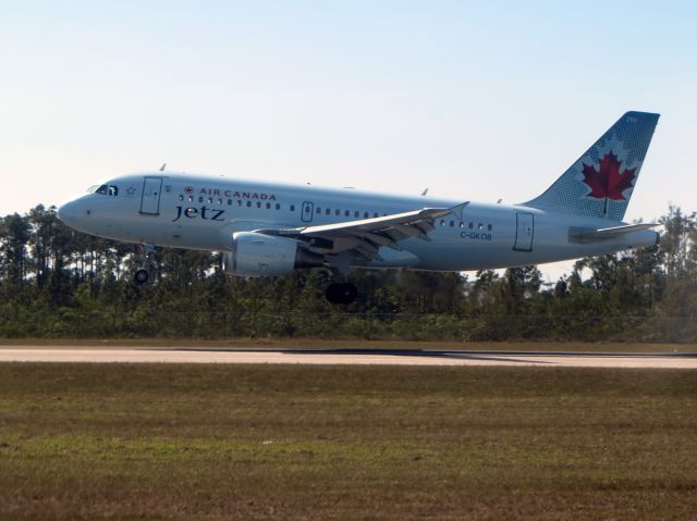 Airbus A319 (C-GKOB) - Landing runway 14. Picking up snowbirds at Nassau, Bahamas.