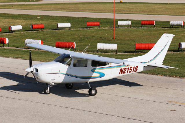 Cessna Centurion (N2151S) - A sunny day by the windsock in KGBG.