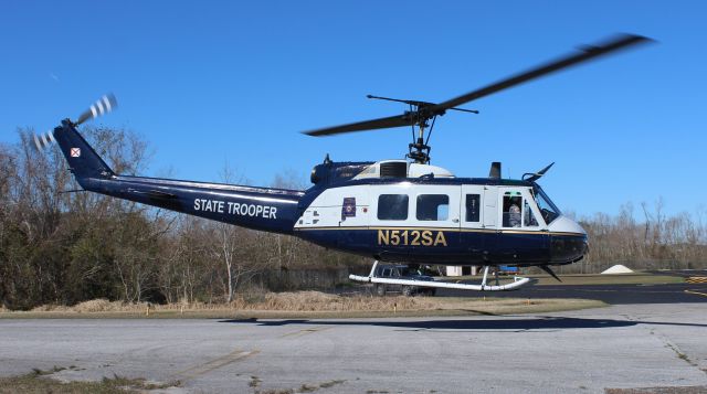 Bell UH-1V Iroquois (N512SA) - The Alabama Law Enforcement Agency's Bell UH-1V Iroquois departing H.L. Sonny Callahan Airport, Fairhope, AL, during Z's Invitational Jet Blast - morning of March 4, 2021.