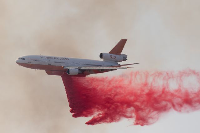 McDonnell Douglas DC-10 (N612AX) - Tanker 910 dropping retardant on a fast moving brush fire only 1 mile West of MFR.