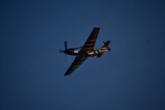 North American P-51 Mustang — - P-51 Crazy Horse screaming overhead during the night show at snf18