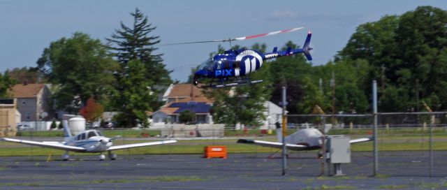 Bell JetRanger (N11TV) - LINDEN AIRPORT-LINDEN, NEW JERSEY, USA-AUGUST 21, 2020: A news helicopter belonging to one of the local New York City television stations is pictured taking off on Runway 27.