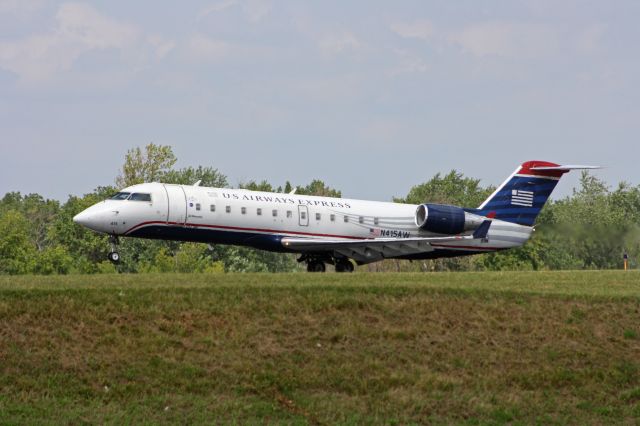 Canadair Regional Jet CRJ-200 (N415AW) - CRJ-200 operated by Air Wisconsin for (formerly) US Airways. Here it is seen departing for Boston.  