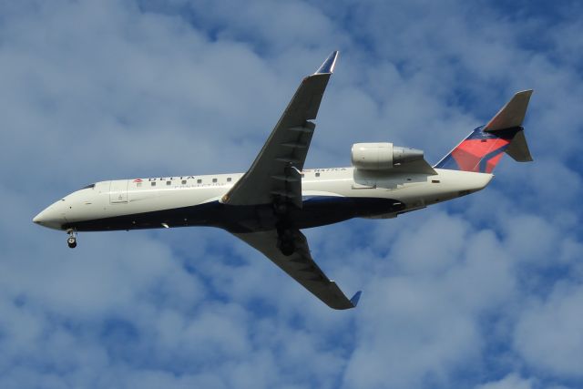 Canadair Regional Jet CRJ-200 (N477CA) - Delta Connection operated by SkyWest arriving at Nashville this morning. 03/15/12