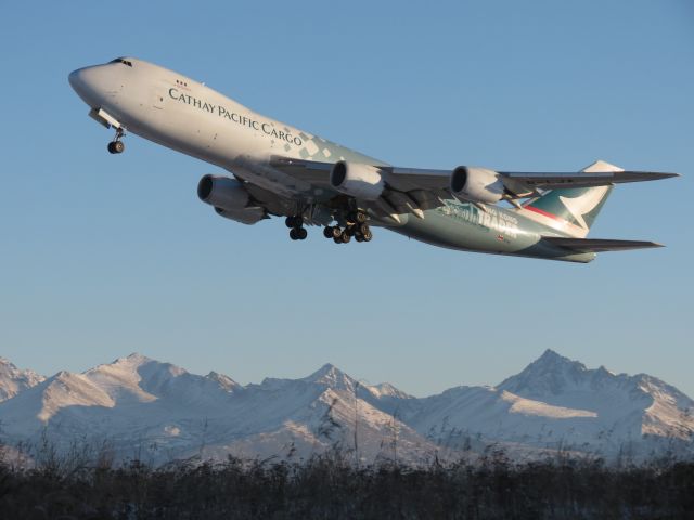 BOEING 747-8 (B-LJA) - Was standing along side the runway with the Chugiak Mountains in the back round.