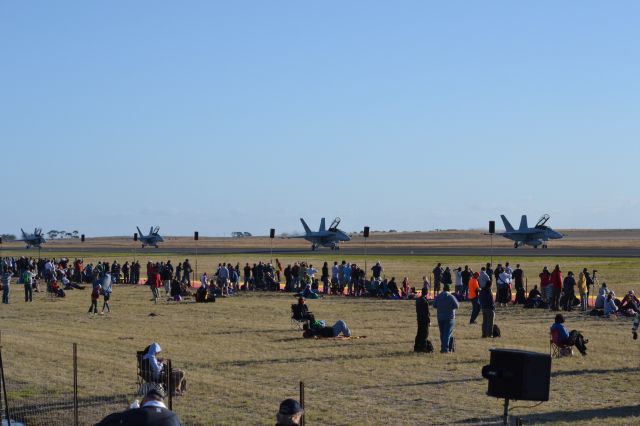 McDonnell Douglas FA-18 Hornet — - 4 RAAF F-18s lined up along the runway at the Australian International Airshow 2013.