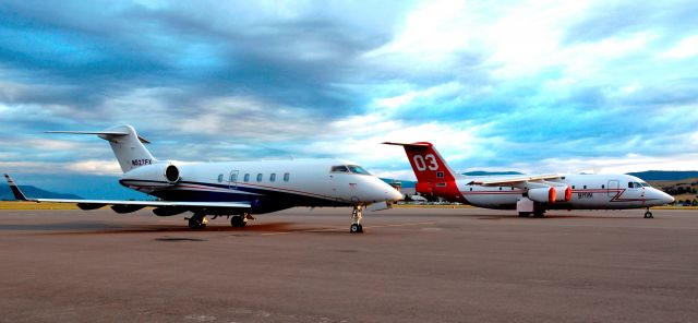 Bombardier Challenger 300 — - Flexjet CL300 and Neptune BAe-146-200A wildfire tanker.