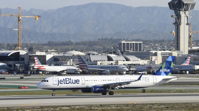 Airbus A321 (N969JT) - Taxiing to gate after landing on 25L at LAX