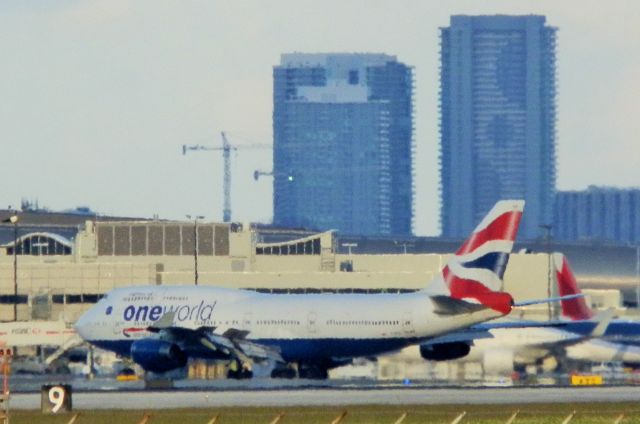 Boeing 747-400 (G-CIVD) - The "Queen of The Skies!"Displaying its spoilers and gradually raising ts flaps"Heading for the gate!