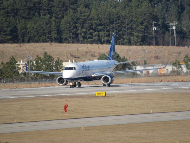 Embraer ERJ-190 (N328JB) - JetBlue flight 1084 to Logan Intl, an Embraer 190 lined up for takeoff on runway 23R. This was taken January 30, 2016 at 3:30 PM.